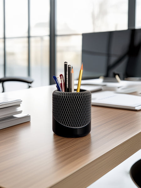 NeoMesh desk organizer holding pens and stationery on a workspace